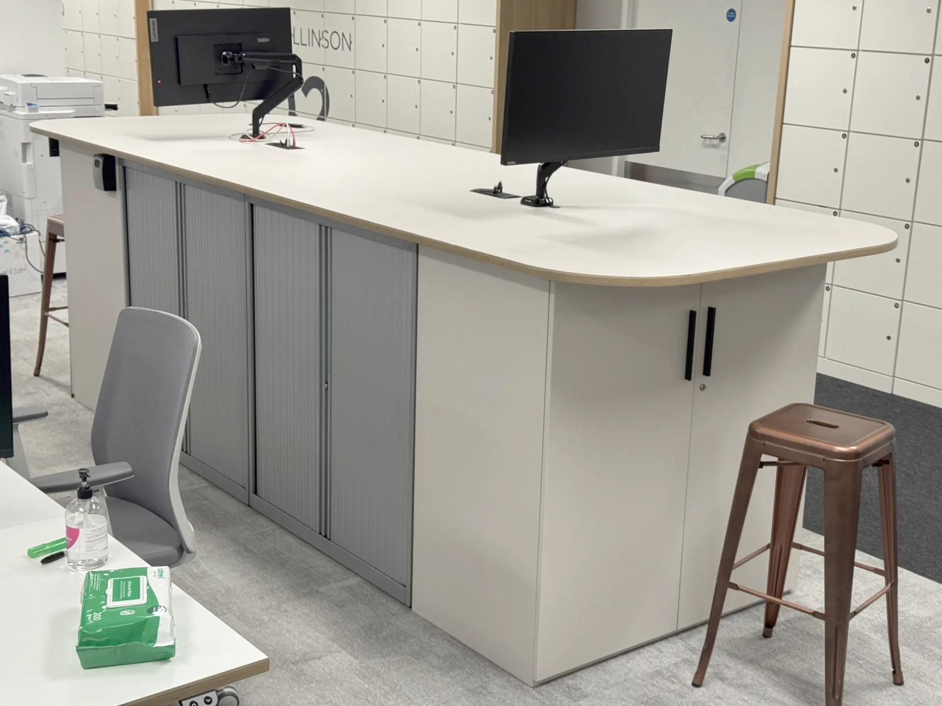 An IT tech bench reworked from existing tambour units with new cupboards, pre-drilled for equipment and power