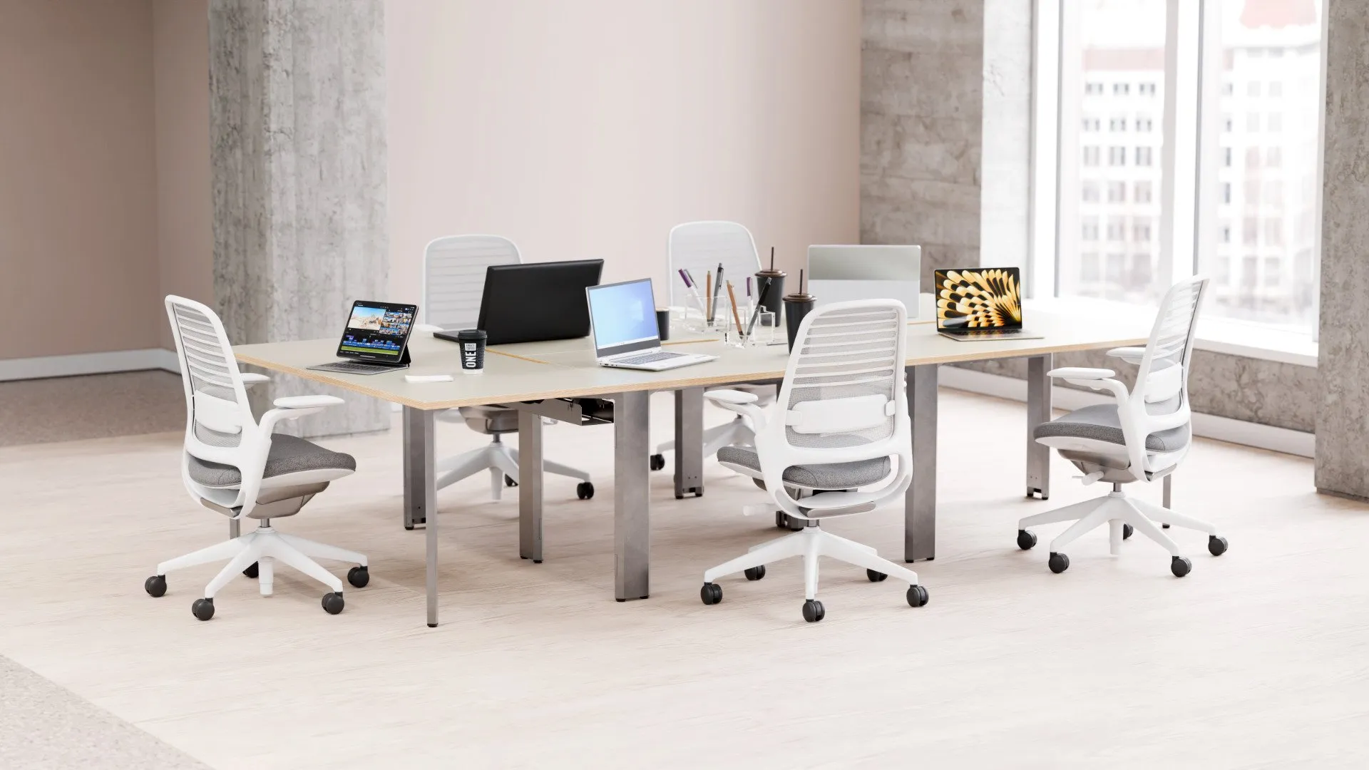 Recon desks configured in a bank of five in a modern co-working office