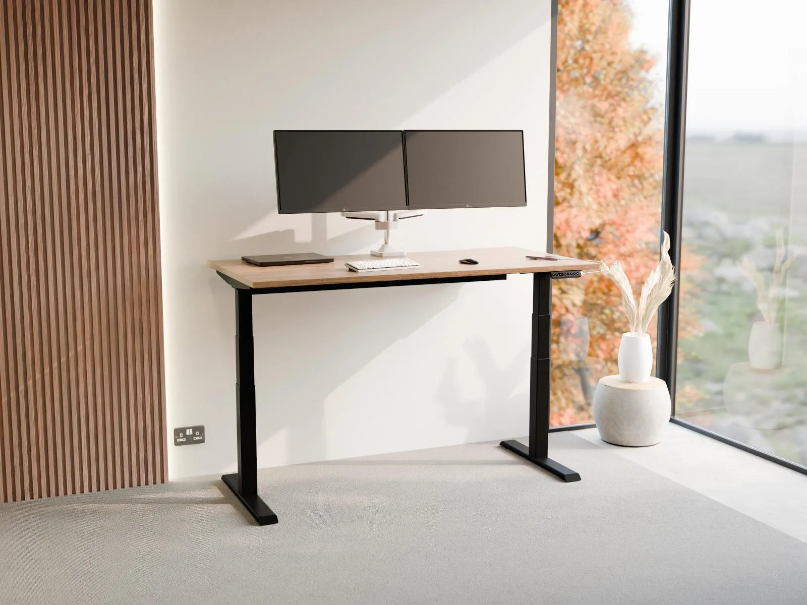 R!se desk with Carini Walnut top in home office setting